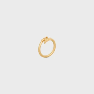 Bague asymétrique Triomphe en laiton avec finition dorée
