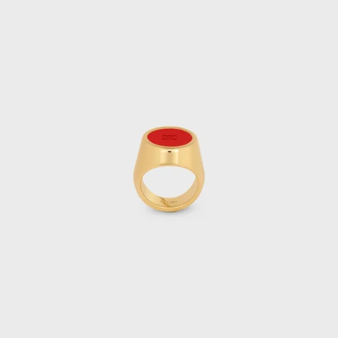 Bague chevalière Triomphe en vernis et laiton avec finition dorée Bague chevalière Triomphe en vernis et laiton avec finition dorée