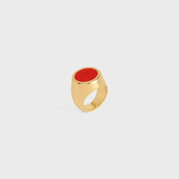 Bague chevalière Triomphe en vernis et laiton avec finition dorée Bague chevalière Triomphe en vernis et laiton avec finition dorée