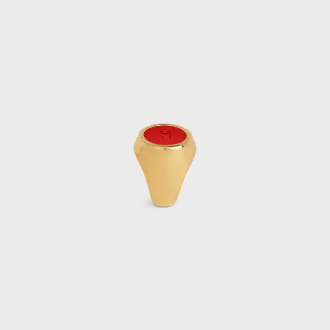 Bague chevalière Triomphe en vernis et laiton avec finition dorée Bague chevalière Triomphe en vernis et laiton avec finition dorée