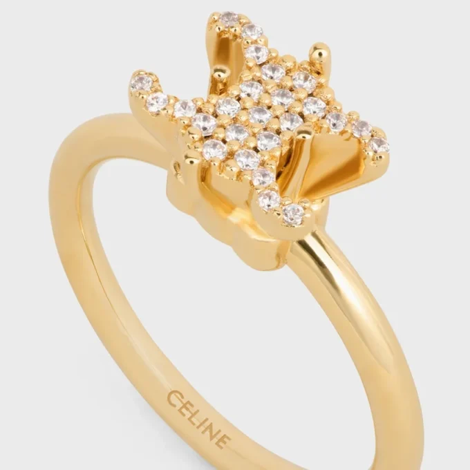 Bague solitaire Triomphe Sparkle en strass et laiton avec finition dorée Bague solitaire Triomphe Sparkle en strass et laiton avec finition dorée