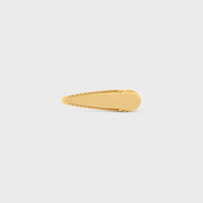 Barrette CELINE en laiton avec finition dorée, acier et zamak Barrette CELINE en laiton avec finition dorée, acier et zamak