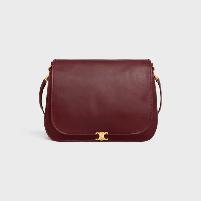 Besace Triomphe souple en cuir d’agneau souple et brillant Besace Triomphe souple en cuir d’agneau souple et brillant