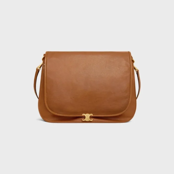 Besace Triomphe souple en cuir d’agneau souple et brillant Besace Triomphe souple en cuir d’agneau souple et brillant