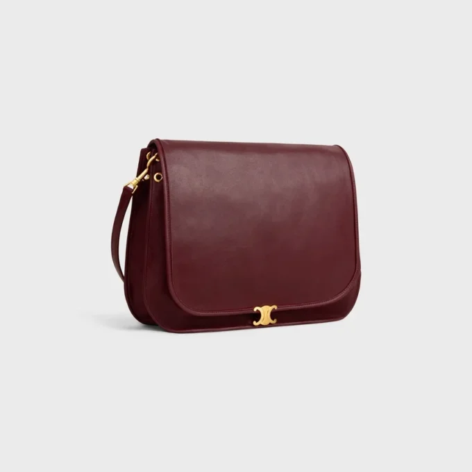 Besace Triomphe souple en cuir d’agneau souple et brillant Besace Triomphe souple en cuir d’agneau souple et brillant