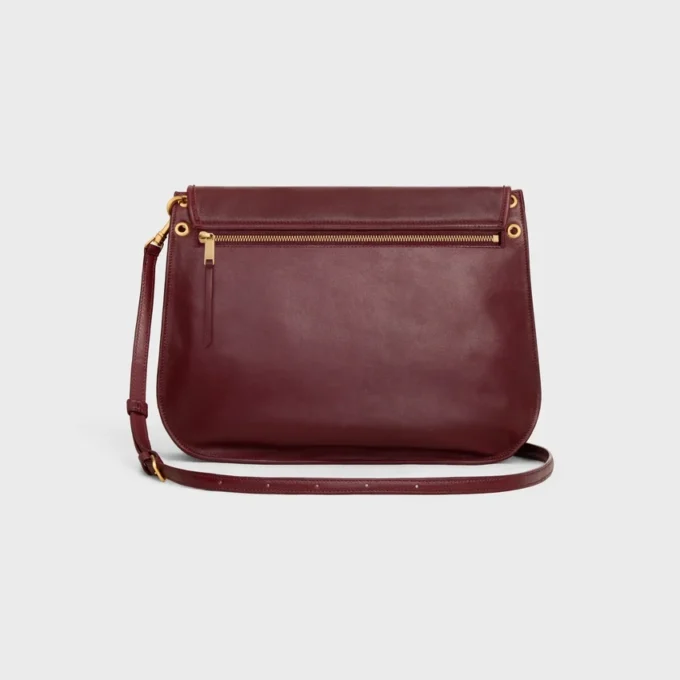 Besace Triomphe souple en cuir d’agneau souple et brillant Besace Triomphe souple en cuir d’agneau souple et brillant