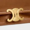 Besace Triomphe souple en cuir d’agneau souple et brillant Besace Triomphe souple en cuir d’agneau souple et brillant