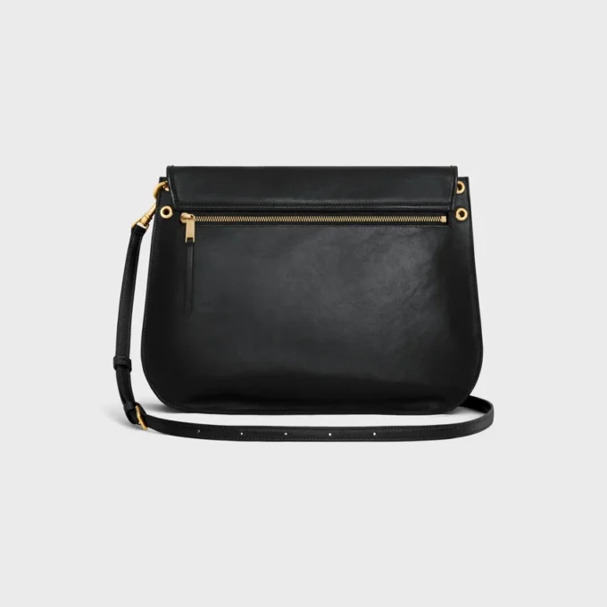 Besace Triomphe souple en cuir d’agneau souple et brillant Besace Triomphe souple en cuir d’agneau souple et brillant