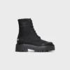 Bottes à lacets CELINE en nylon et cuir de taureau brillant Bottes à lacets CELINE en nylon et cuir de taureau brillant