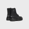 Bottes à lacets CELINE en nylon et cuir de taureau brillant Bottes à lacets CELINE en nylon et cuir de taureau brillant