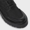 Bottes à lacets CELINE en nylon et cuir de taureau brillant Bottes à lacets CELINE en nylon et cuir de taureau brillant