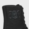 Bottes à lacets CELINE en nylon et cuir de taureau brillant Bottes à lacets CELINE en nylon et cuir de taureau brillant