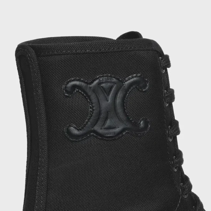 Bottes à lacets CELINE en nylon et cuir de taureau brillant Bottes à lacets CELINE en nylon et cuir de taureau brillant