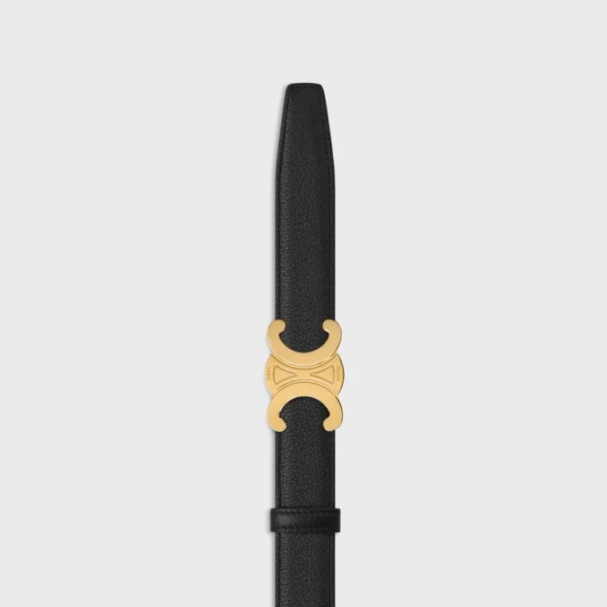 Boucle Triomphe en métal et lanière réversible de 25 mm en cuir de veau lisse et grainé Boucle Triomphe en métal et lanière réversible de 25 mm en cuir de veau lisse et grainé