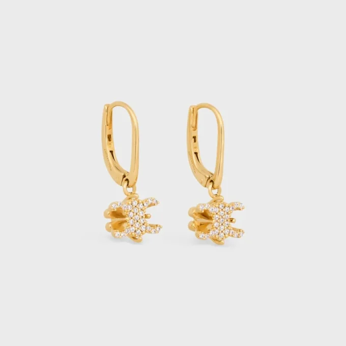 Boucles d’oreilles Triomphe Solitaire Sparkle en strass et laiton avec finition dorée Boucles d’oreilles Triomphe Solitaire Sparkle en strass et laiton avec finition dorée