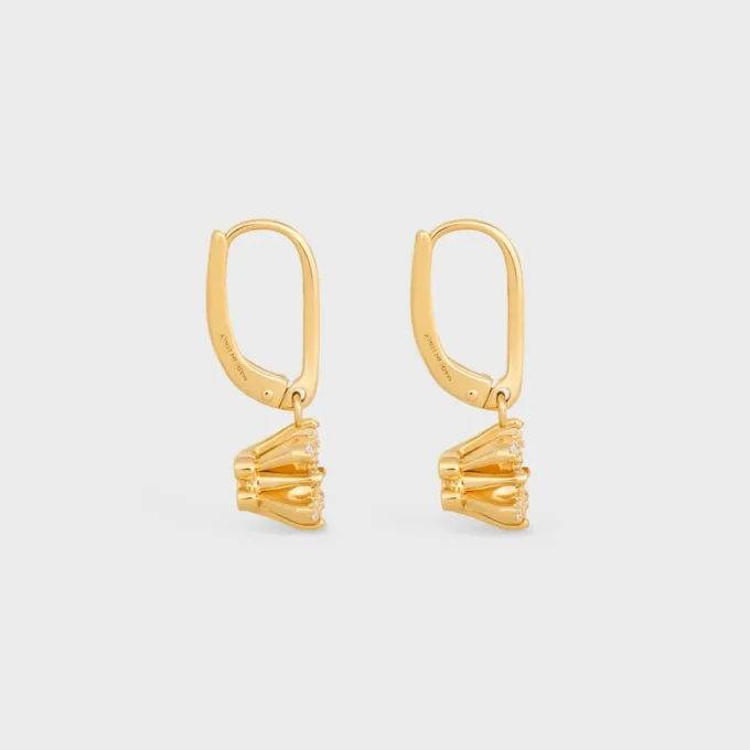 Boucles d’oreilles Triomphe Solitaire Sparkle en strass et laiton avec finition dorée Boucles d’oreilles Triomphe Solitaire Sparkle en strass et laiton avec finition dorée