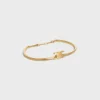 Bracelet articulé Triomphe en laiton avec finition dorée Bracelet articulé Triomphe en laiton avec finition dorée