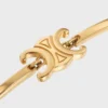 Bracelet articulé Triomphe en laiton avec finition dorée Bracelet articulé Triomphe en laiton avec finition dorée