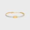 Bracelet articulé Triomphe en émail et laiton avec finition dorée Bracelet articulé Triomphe en émail et laiton avec finition dorée