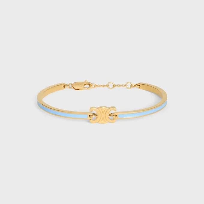 Bracelet articulé Triomphe en émail et laiton avec finition dorée Bracelet articulé Triomphe en émail et laiton avec finition dorée