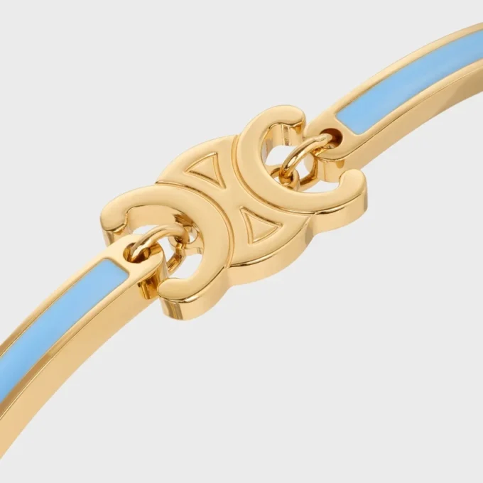 Bracelet articulé Triomphe en émail et laiton avec finition dorée Bracelet articulé Triomphe en émail et laiton avec finition dorée