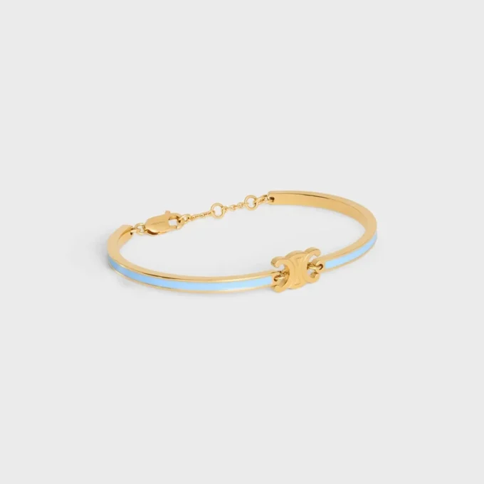 Bracelet articulé Triomphe en émail et laiton avec finition dorée Bracelet articulé Triomphe en émail et laiton avec finition dorée
