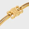 Bracelet articulé Triomphe scintillant en strass et laiton avec finition dorée Bracelet articulé Triomphe scintillant en strass et laiton avec finition dorée