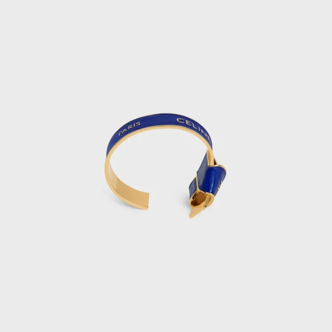 Bracelet CELINE à nœud en émail et laiton avec finition dorée Bracelet CELINE à nœud en émail et laiton avec finition dorée