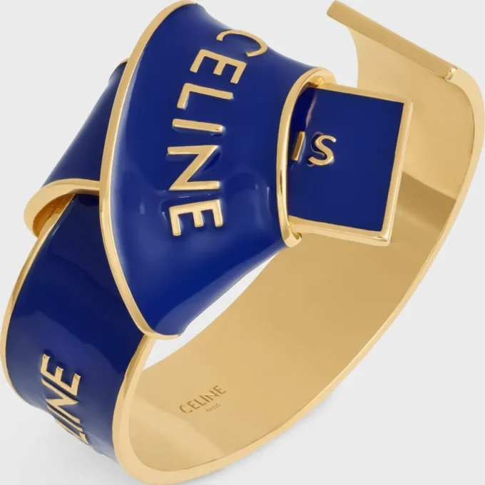 Bracelet CELINE à nœud en émail et laiton avec finition dorée Bracelet CELINE à nœud en émail et laiton avec finition dorée