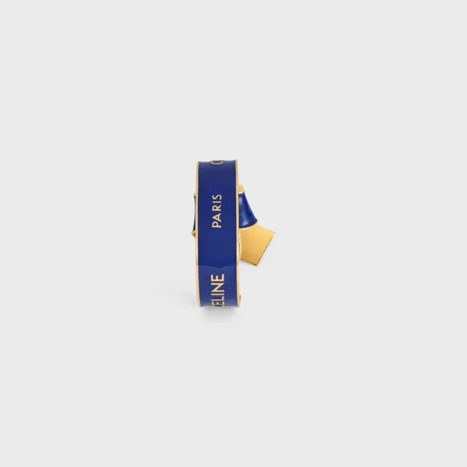 Bracelet CELINE à nœud en émail et laiton avec finition dorée Bracelet CELINE à nœud en émail et laiton avec finition dorée