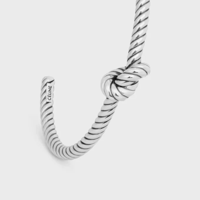 Bracelet manchette à motif cordon noué en laiton avec finition rhodiée Bracelet manchette à motif cordon noué en laiton avec finition rhodiée