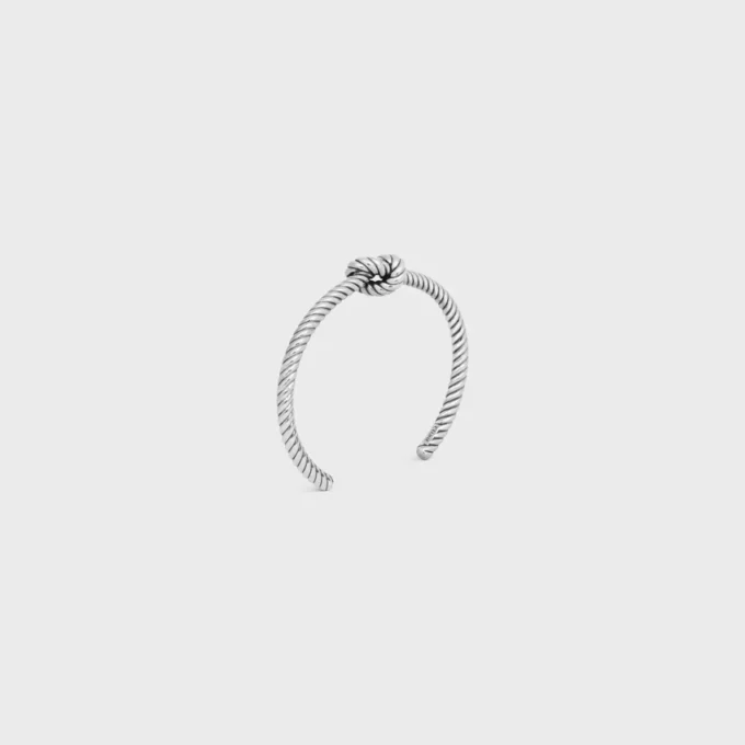 Bracelet manchette à motif cordon noué en laiton avec finition rhodiée Bracelet manchette à motif cordon noué en laiton avec finition rhodiée