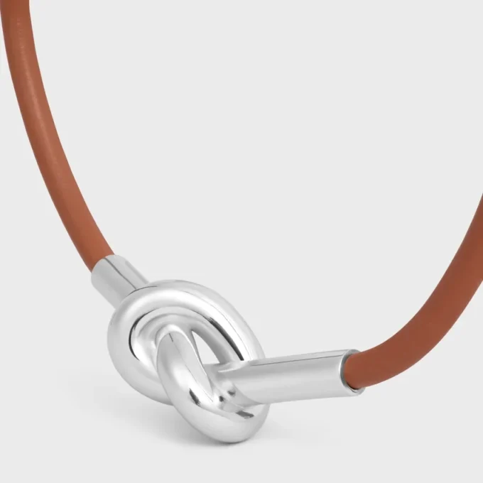 Bracelet à nœud en cuir de veau et laiton avec finition rhodiée Bracelet à nœud en cuir de veau et laiton avec finition rhodiée