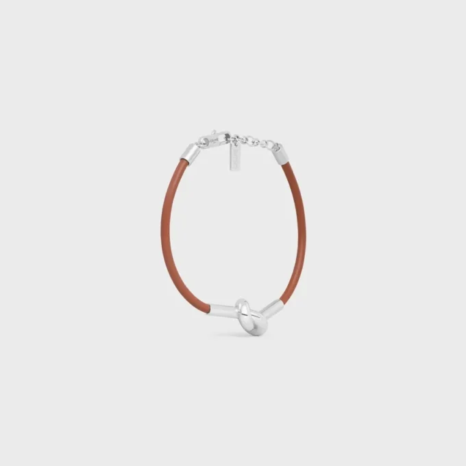 Bracelet à nœud en cuir de veau et laiton avec finition rhodiée Bracelet à nœud en cuir de veau et laiton avec finition rhodiée
