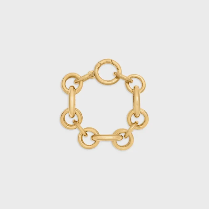 Bracelet épais CELINE Charms Heritage en laiton avec finition dorée Bracelet épais CELINE Charms Heritage en laiton avec finition dorée