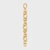 Bracelet épais CELINE Charms Heritage en laiton avec finition dorée Bracelet épais CELINE Charms Heritage en laiton avec finition dorée