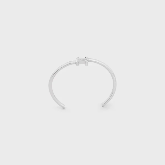 Bracelet Triomphe asymétrique en laiton avec finition rhodiée