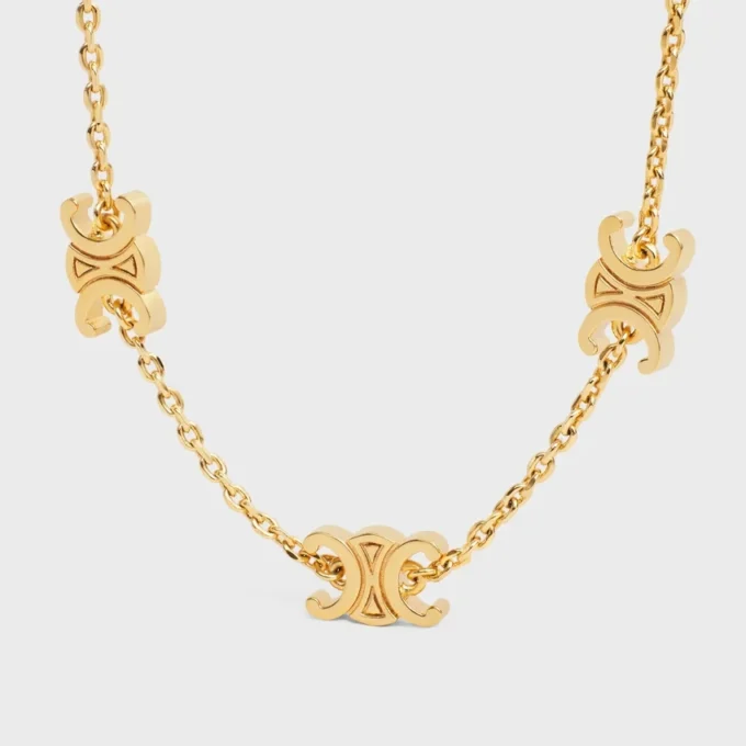 Bracelet Triomphe Mini Triomphe en laiton avec finition dorée Bracelet Triomphe Mini Triomphe en laiton avec finition dorée
