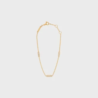 Bracelet triple de la ligne CELINE en or jaune et diamants Bracelet triple de la ligne CELINE en or jaune et diamants