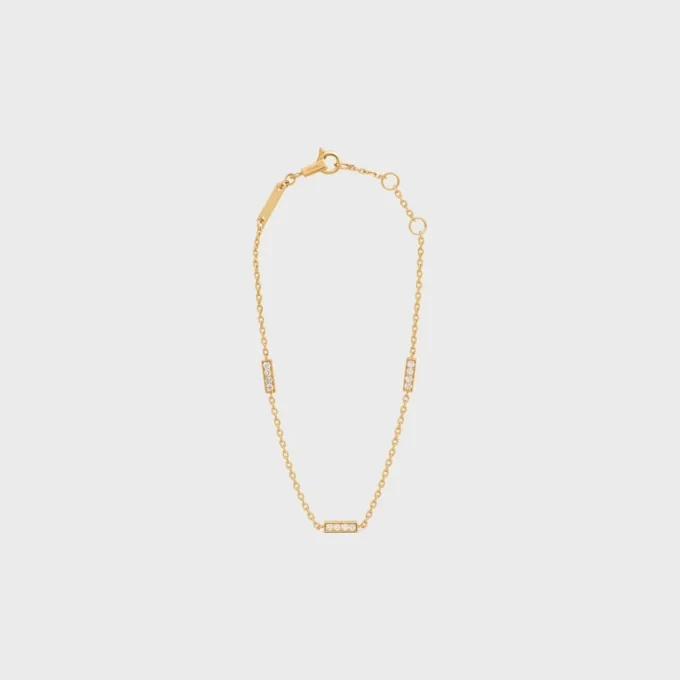 Bracelet triple de la ligne CELINE en or jaune et diamants Bracelet triple de la ligne CELINE en or jaune et diamants