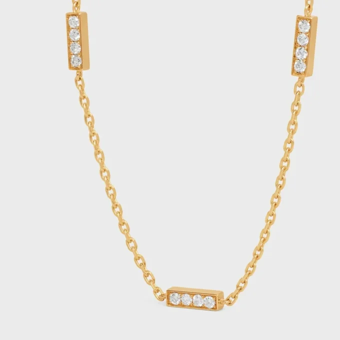 Bracelet triple de la ligne CELINE en or jaune et diamants Bracelet triple de la ligne CELINE en or jaune et diamants