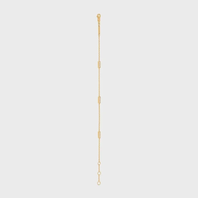 Bracelet triple de la ligne CELINE en or jaune et diamants Bracelet triple de la ligne CELINE en or jaune et diamants