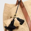 Breloque multi-pompons en raphia et cuir d&rsquo;agneau lisse