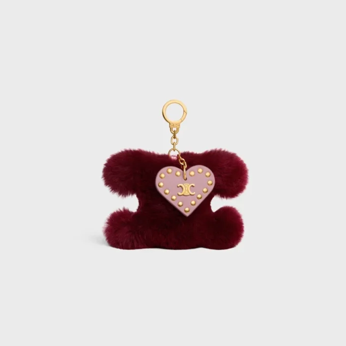 Breloque Triomphe Pom-Pom en peau de mouton et cuir de veau