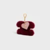 Breloque Triomphe Pom-Pom en peau de mouton et cuir de veau