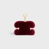 Breloque Triomphe Pom-Pom en peau de mouton et cuir de veau
