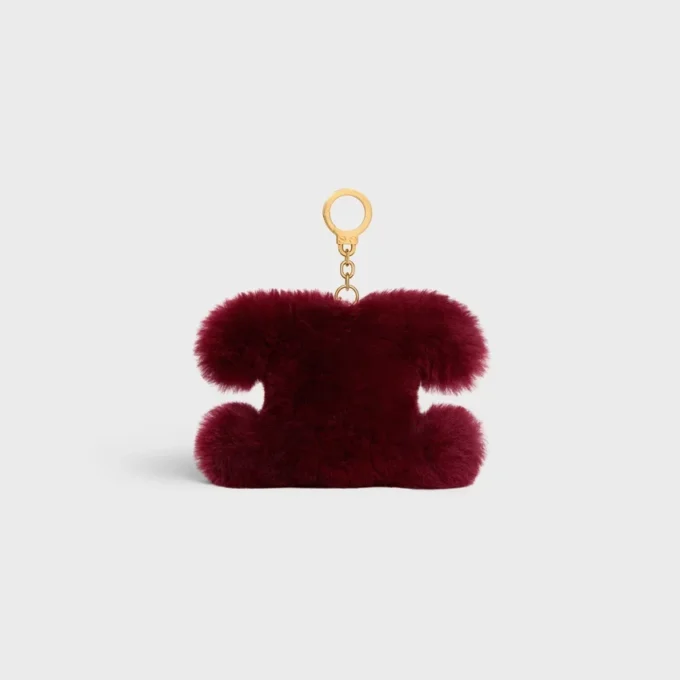 Breloque Triomphe Pom-Pom en peau de mouton et cuir de veau