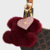 Breloque Triomphe Pom-Pom en peau de mouton et cuir de veau