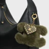 Breloque Triomphe Pom-Pom en peau de mouton et cuir de veau