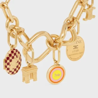 Breloques Médaille Sulky en émail et laiton avec finition dorée